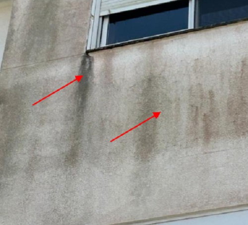 Laudo técnico de infiltrações em fachada de edifício no bairro Canasvieiras, em Florianópolis, com análise das causas e dos danos causados pela umidade.